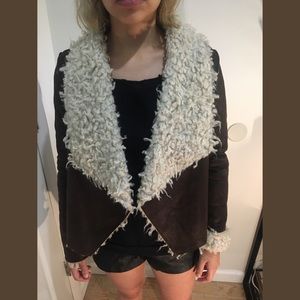 Leather jacket lined with faux fur on the inside